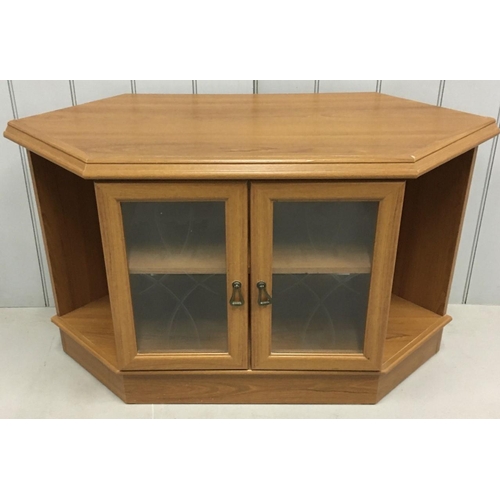 198 - A Corner TV Cabinet, Two glazed doors, single internal shelf. Dimensions(cm) H65 W105 D45.