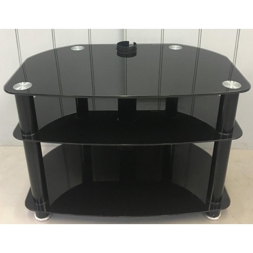 203 - A black, glass TV stand with black legs and cable management.
Dimensions(cm) H51 W71 D46