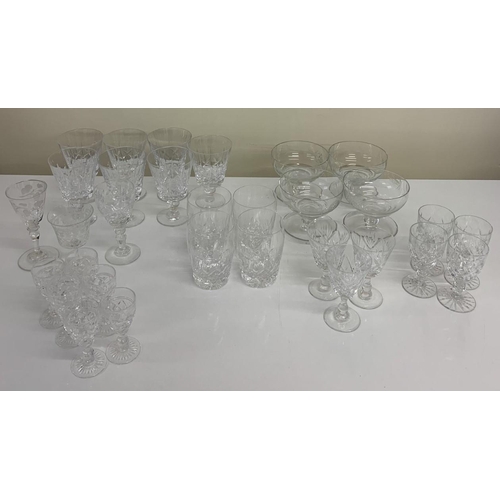 210 - A selection of crystal glassware. Approximately 31 items in total. Includes sherry glasses, wine gla... 