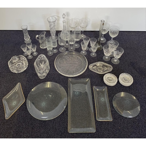 225 - A mixed lot of glassware & Crystal pieces. Approximately 37 items including vases, decanter, table d... 