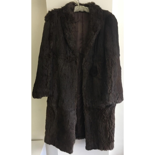 261 - A vintage, dark brown, Mink Fur Coat. Three quarter length.