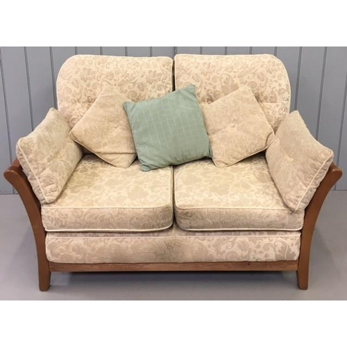 158 - A vintage, cottage style suite. Consists of a beige/patterned upholstered two-seater sofa, with two ... 