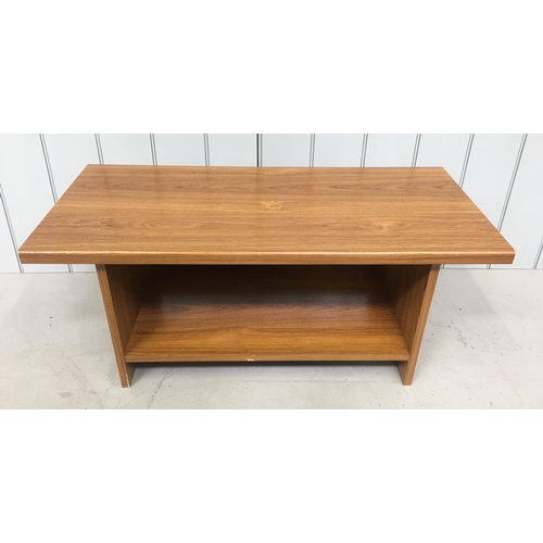 192 - A heavy teak veneered Coffee/TV Table.
Dimensions(cm) H41 W95 D45