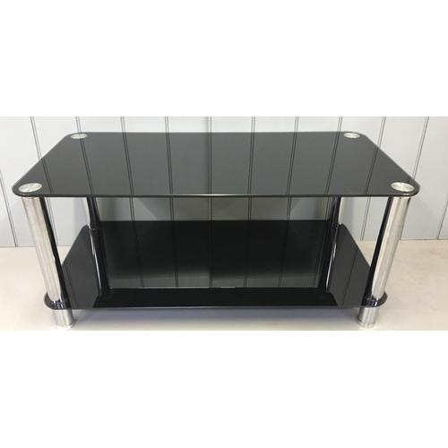 202 - A black glass TV Stand/Coffee Table with chrome legs.
Dimensions(cm) H46 W100 D50