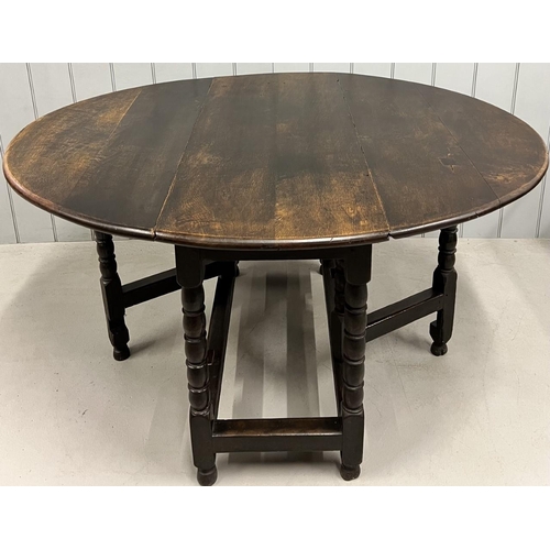 102 - An early 20th century gateleg table.
Dimensions(cm) H74, W50/147, D113