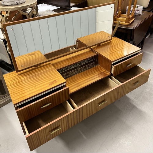 162 - A mid-century teak dressing table,
Dimensions(cm) H119, W144, D43.