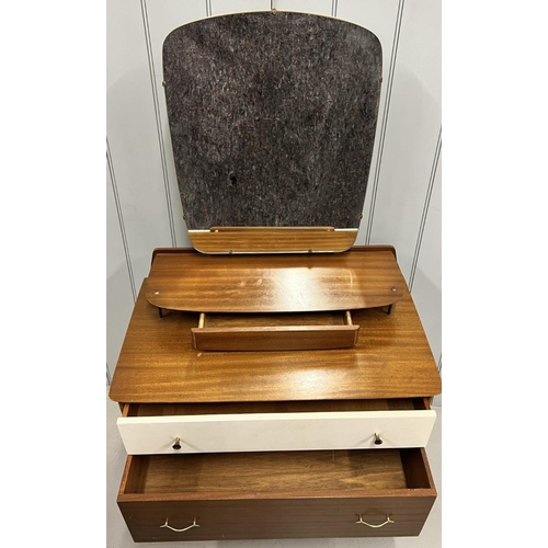 163 - A mid-century teak dressing table.
Dimensions(cm) H130, W78, D45.