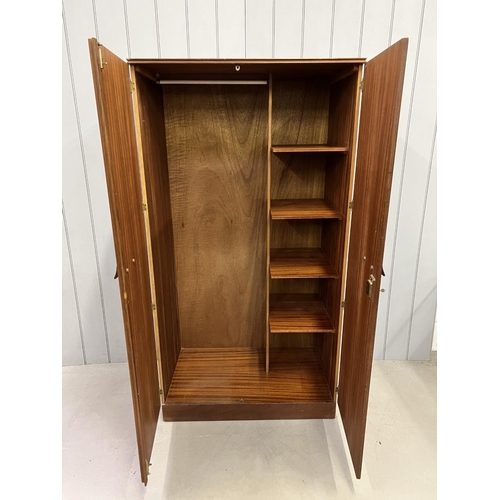 183 - A mid-century teak wardrobe, with single rail & compartmental shelves. Dimensions(cm) H174, W92, D55... 