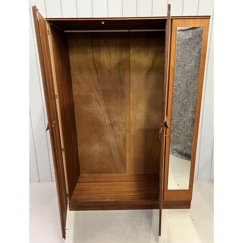 184 - A mid-century teak double wardrobe, with rail & external tall mirror. Dimensions(cm) H174, W123, D55... 