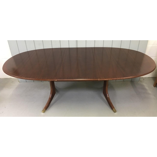 10 - An oval, extending Dining Table.
Dimensions(cm) H72 W162/208, D107