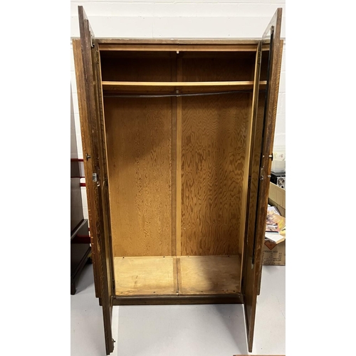 54 - A vintage, oak double wardrobe. Internal clothes rail, shelf and mirror.
Dimensions(cm) H183, W123, ... 