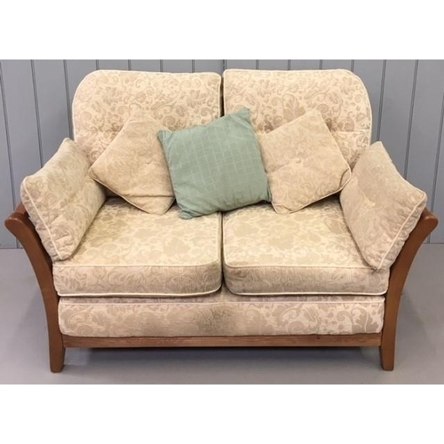 171 - A vintage, cottage style suite. Consists of a beige/patterned upholstered two-seater sofa, with two ... 