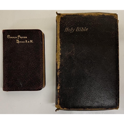 298 - A 19th century Holy Bible, together with a hymn book from the same era.