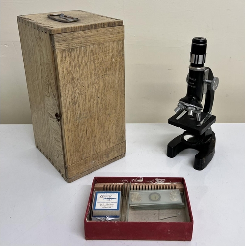 322A - A boxed, microscope (50x - 900x) by Janik.