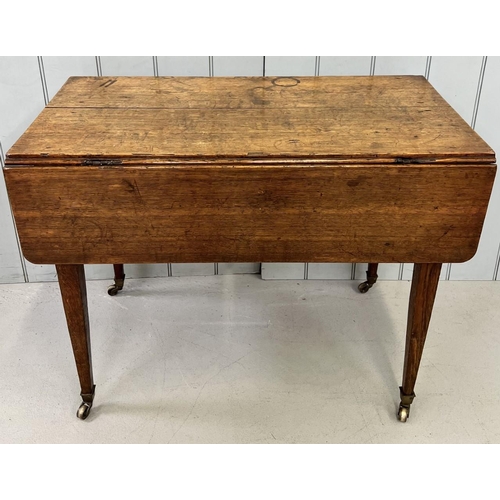 29 - An Edwardian oak Pembroke table. Brass handled drawer, tapered legs with spade feet. Dimensions(cm) ... 