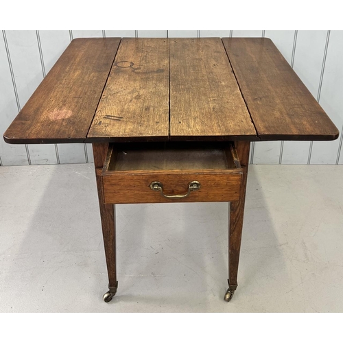 29 - An Edwardian oak Pembroke table. Brass handled drawer, tapered legs with spade feet. Dimensions(cm) ... 