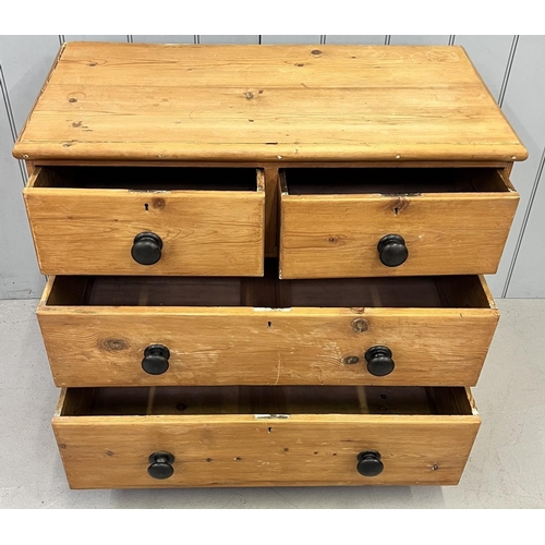 71 - A Victorian pine chest of two over two drawers. Dimensions(cm) H70 W88, D46.