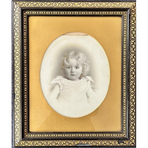 353 - A framed child's portrait, early 20th century. 
Dimensions(cm) H52 W44