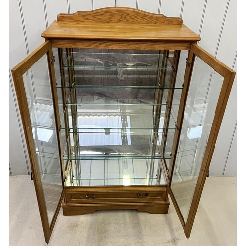 56 - A vintage display cabinet, with glazed doors/sides/shelves & mirrored back. Dimensions(cm) H152, W82... 