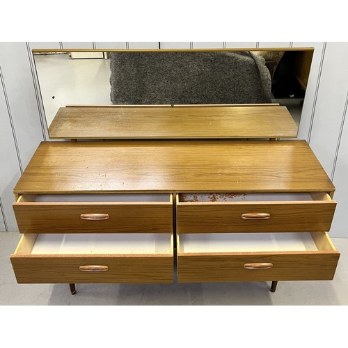 142A - A mid0century dressing table. Four drawers, with full length mirror. Dimensions(cm) H112, W126, D41.