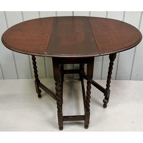 6 - An Edwardian gateleg table, with barley-twist legs.
Dimensions(cm) H70, W28/94, D60.