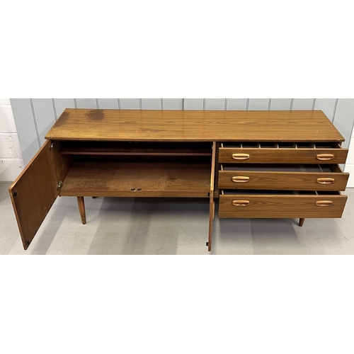 125 - A teak-veneered, mid-century, long sideboard.. Dimensions(cm) H72, W177, D43.