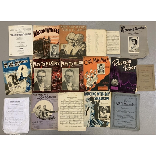 256 - A large collection of vintage music sheets.