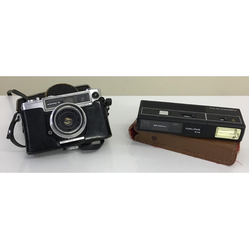 272 - Two vintage cameras. Halina STB Flashmatic 110 Tele & case, together with a Yashica Minister D 35mm ... 