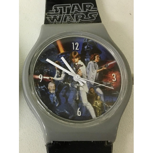 390 - Two identical 1997 analogue Star Wars watches.