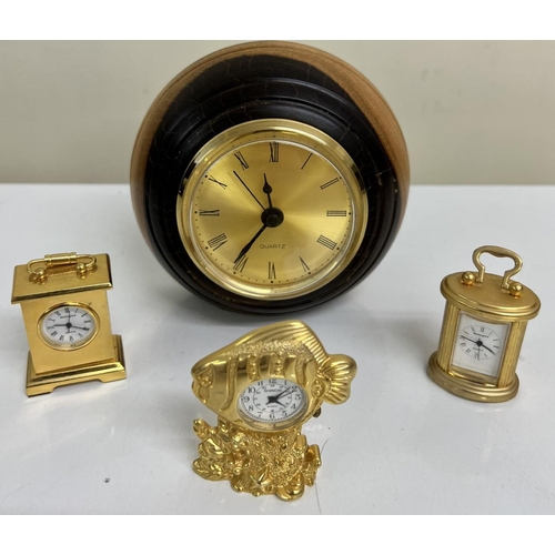 405 - A mixed lot of four vintage, gold-coloured clocks. Three miniature clocks, two by Wellington & one b... 