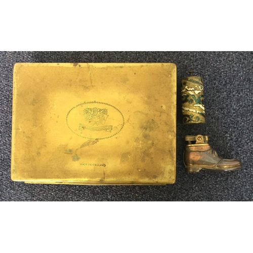 479 - A mixed lot of smoker's items. A brass 'boot' lighter, brass & enamel vesta case, together with a 'S... 