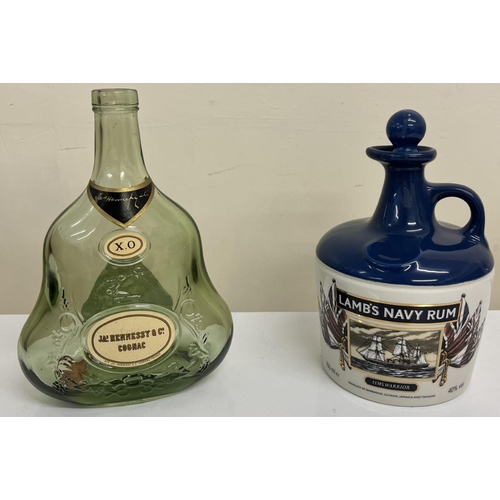 487 - A 'Lambs' navy rum jug & a 'JAs Hennessy & Co.' bottle.
Both empty and used.