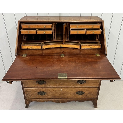 111C - A good quality Georgian, oak bureau. Fall front, with fitted interior, four graduated drawers & bras... 