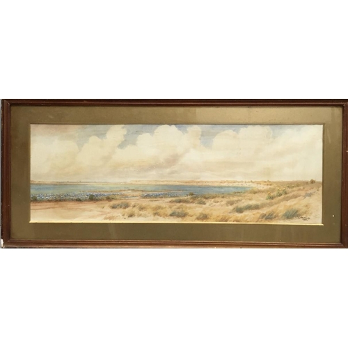 384C - A framed sea view watercolour, signed & dated 1928. 39cm x 89cm.