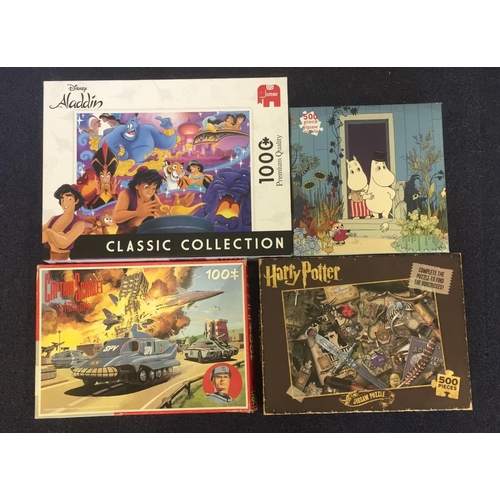 2480 - A mixed lot of 4 TV/Film themed jigsaws. Includes Disney Aladdin, Moomin, Harry Potter & Captain Sca... 