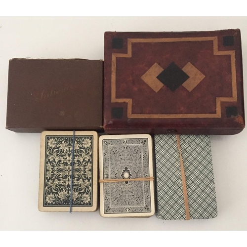 2491 - A selection of vintage playing cards. Includes a set of patience cards with booklet.