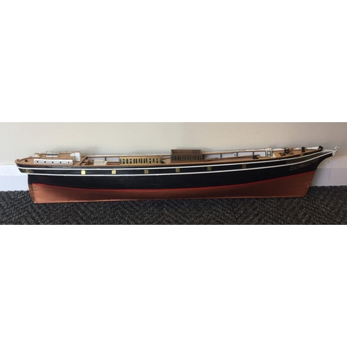 2499 - A large scale, wooden model hull of the Cutty Sark. Length 95cm.