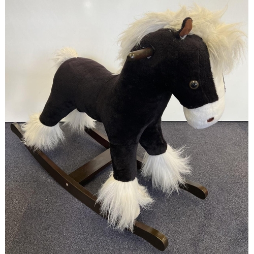 2502 - A fur rocking horse, plays horse sounds when ear is pressed. No makers mark present.
Dimensions(cm):... 