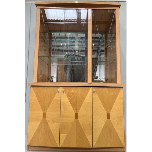 11 - A good quality, contemporary part-glazed display cabinet. Dimensions(cm) H207, W130, D52.