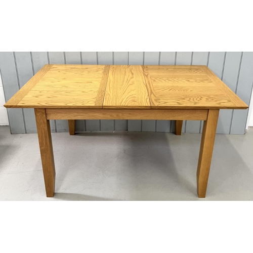 16 - A modern, extending dining table. Dimensions(cm) H74, W120/150, D90.