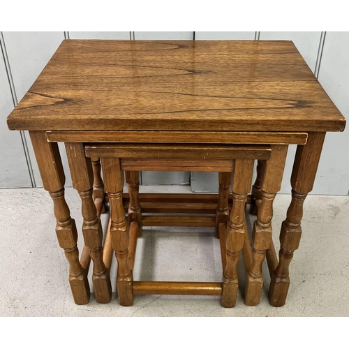26 - A vintage nest of three tables. Largest dimensions(cm) H47, W49, D33.