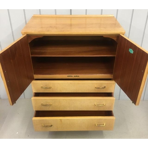 64D - A 'Lebus-Link' mid-century tallboy. Single-shelved cupboard over three graduated drawers. Dimensions... 