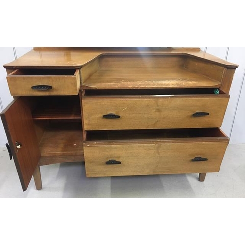 65B - A 'Lebus-Link' mid-century dressing table. Tilting mirror above single cupboard & three drawers. Dim... 