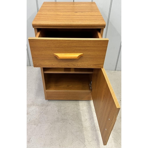 76 - A teak veneered bedside cabinet. Dimensions(cm) H68, W38, D43.