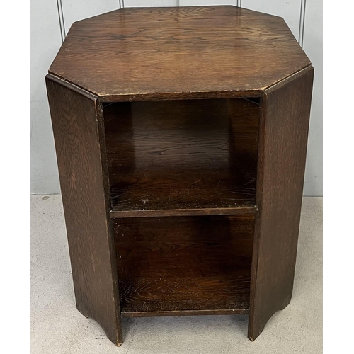 97 - A small, octagonal, oak side table. Dimensions(cm) H57, W46, D45.