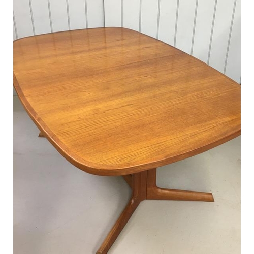 128 - A stunning mid-century Danish teak, extending dining table, by Niels Moller for Mobelfabrik. Two ext... 