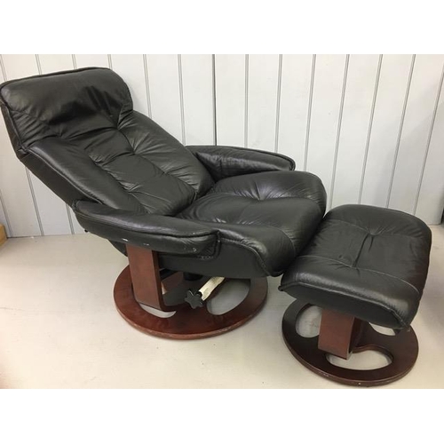 139 - A vintage, black leather reclining chair & footstool. Chair dimensions(cm) H98(40 to seat), W84, D84... 