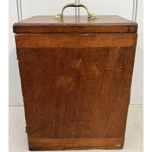 291 - A 19th century, cased, brass microscope.