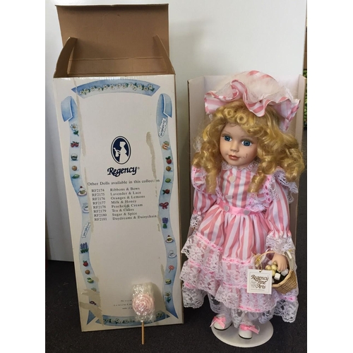 1812 - Regency Fine Arts - 'Sugar & Spice' doll, with lolly pop & stand. Model RF2180. Doll has mark on fac... 