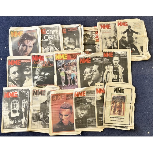 1718 - A large collection of 1980's NME newspapers.